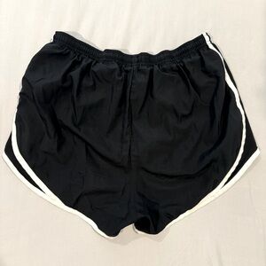 Black M Nike dry fit running shorts.